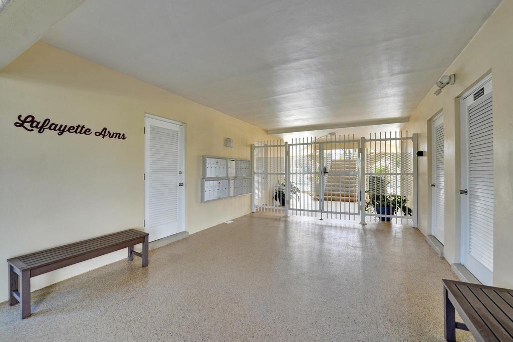 2866 Northeast 30th Street, Unit 9 Fort Lauderdale, FL 33306 - Photo 54 of 54 a view of an empty room with glass door