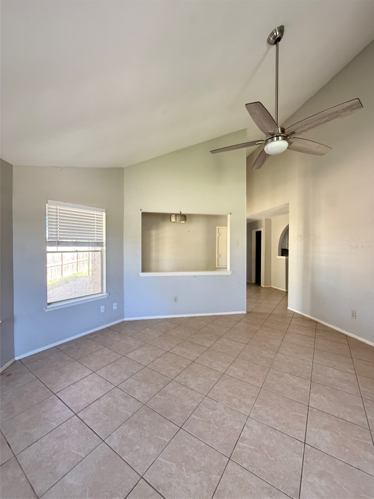 23346 Prairie Bird Drive Spring, TX 77373 - Photo 8 of 16 an empty room with windows and fan