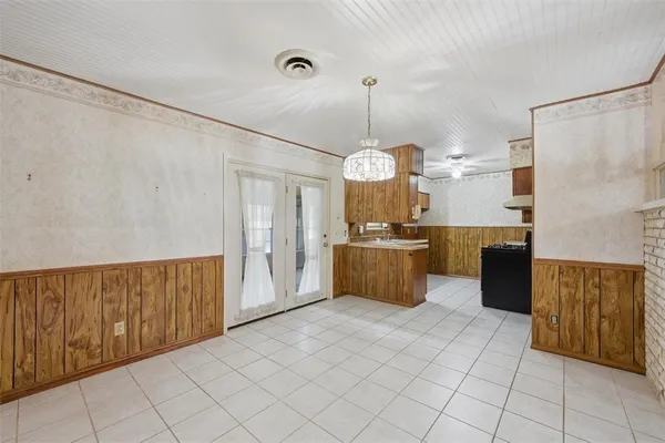 a large kitchen with cabinets