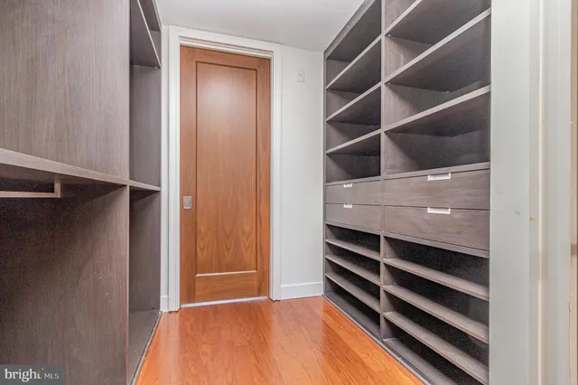a view of an empty walk in closet