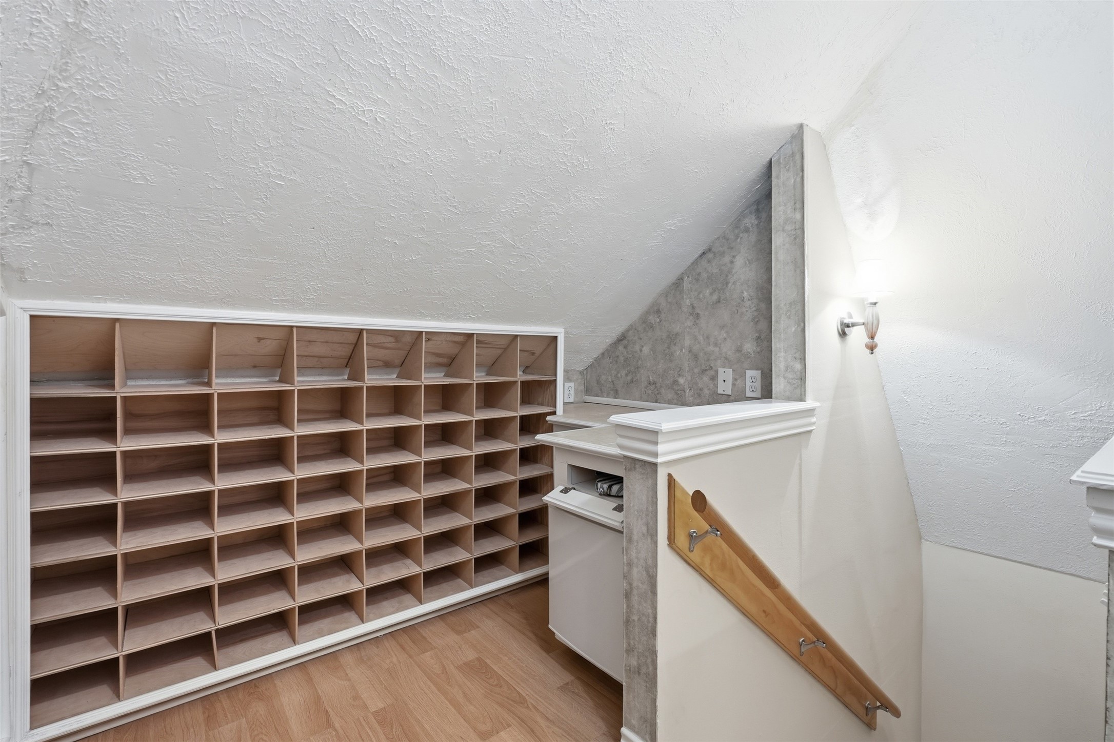 8310 Mentmore Drive Spring, TX 77379 - Photo 33 of 47 Designed to impress, this oversized primary closet is a dream space for organization and everyday convenience.