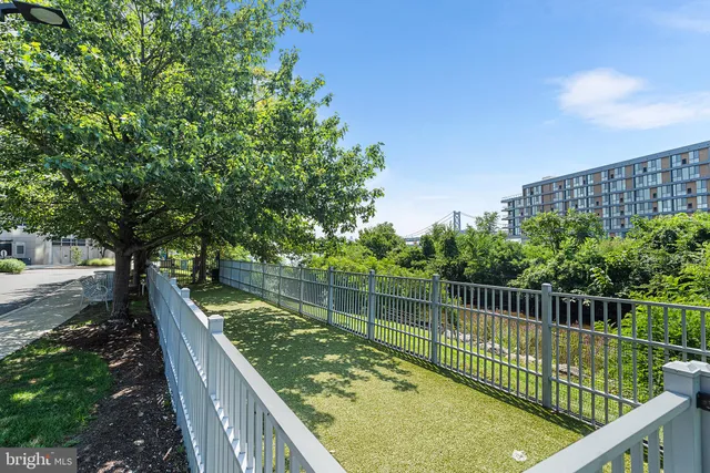 a swimming pool with lawn chairs