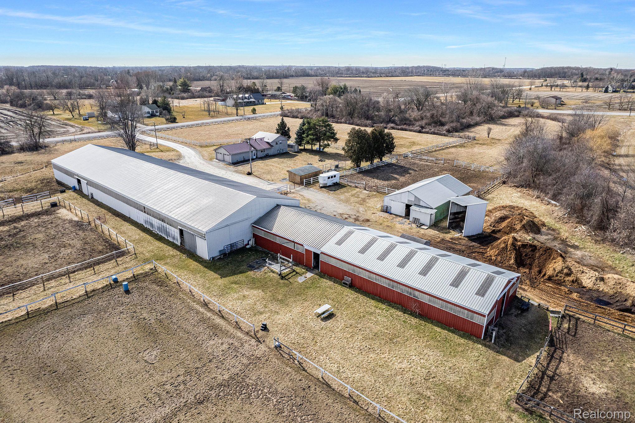 8820 Sparling Road Goodells, MI 48027 - Photo 3 of 45 View of the Barns including the indoor arena