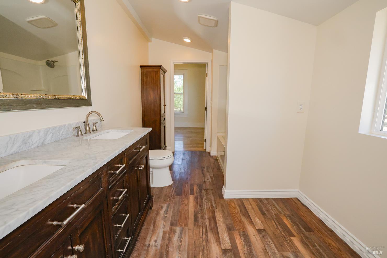 7948 North Meridian Road Dixon, CA 95620 - Photo 28 of 59 a bathroom with a sink and a mirror