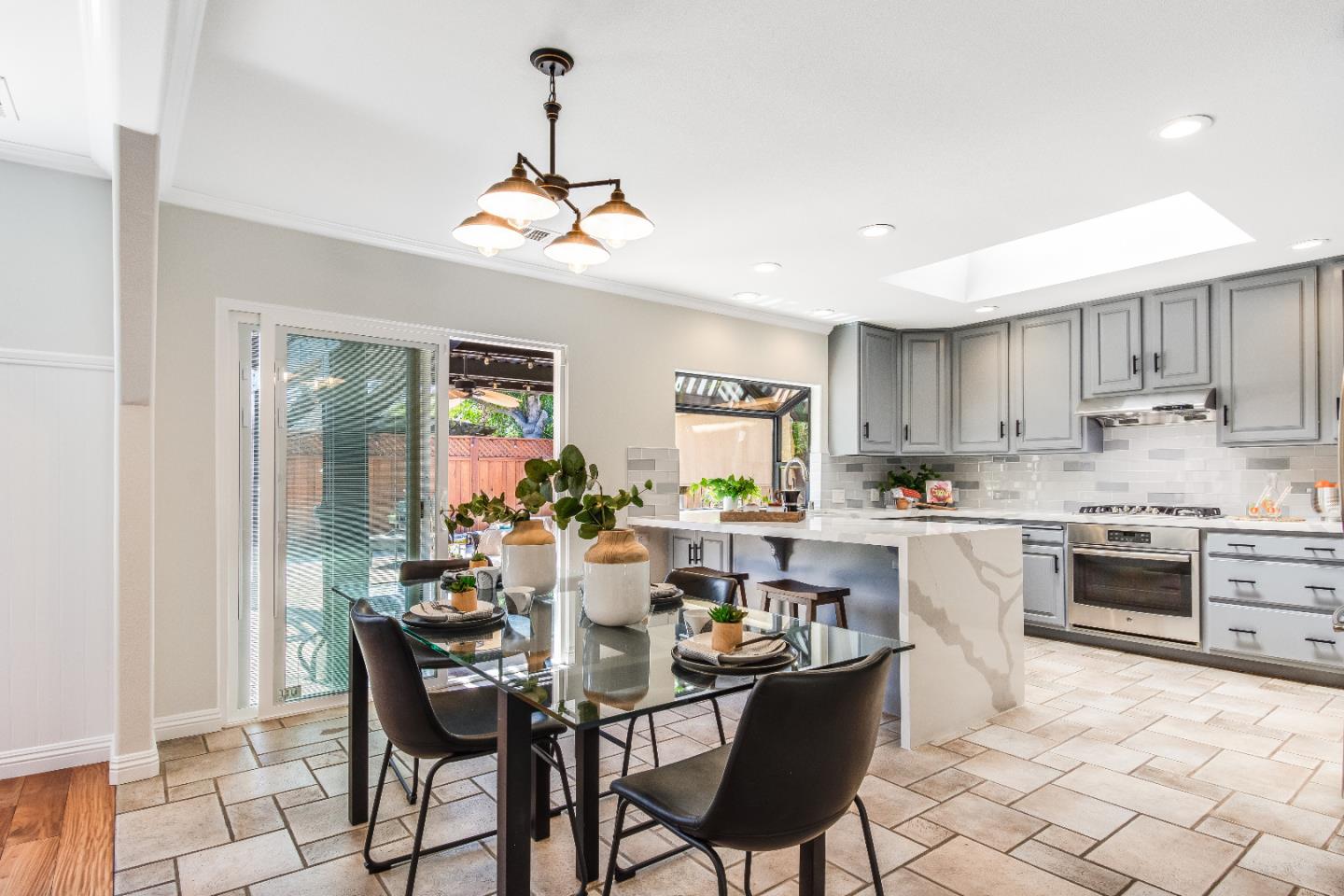 1674 Milroy Place San Jose, CA 95124 - Photo 4 of 12 a view of a dining room with furniture window and wooden floor