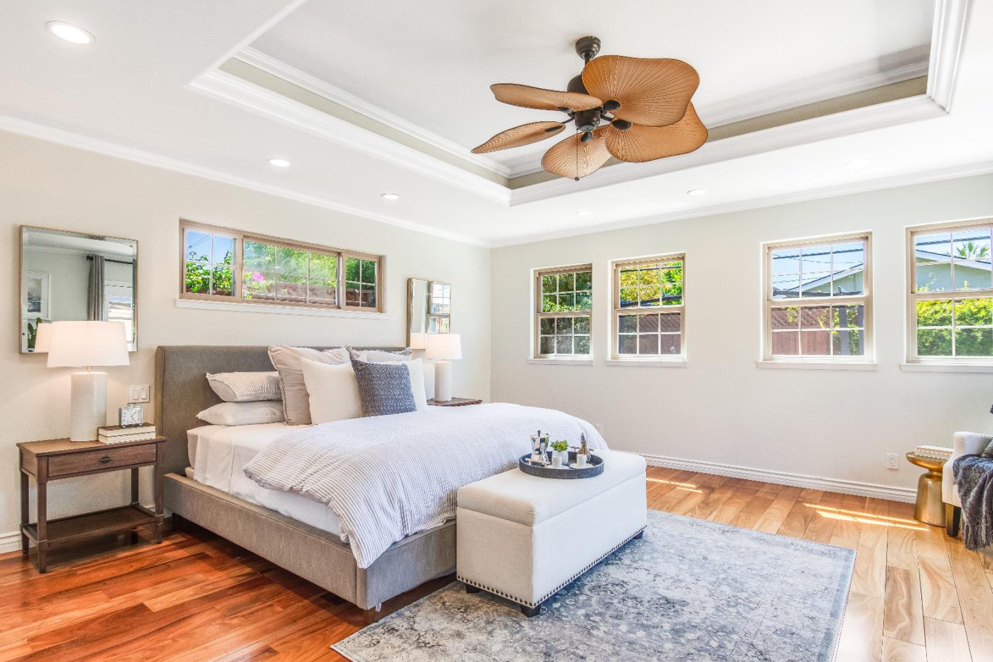 1674 Milroy Place San Jose, CA 95124 - Photo 6 of 12 a bedroom with a bed and a chandelier