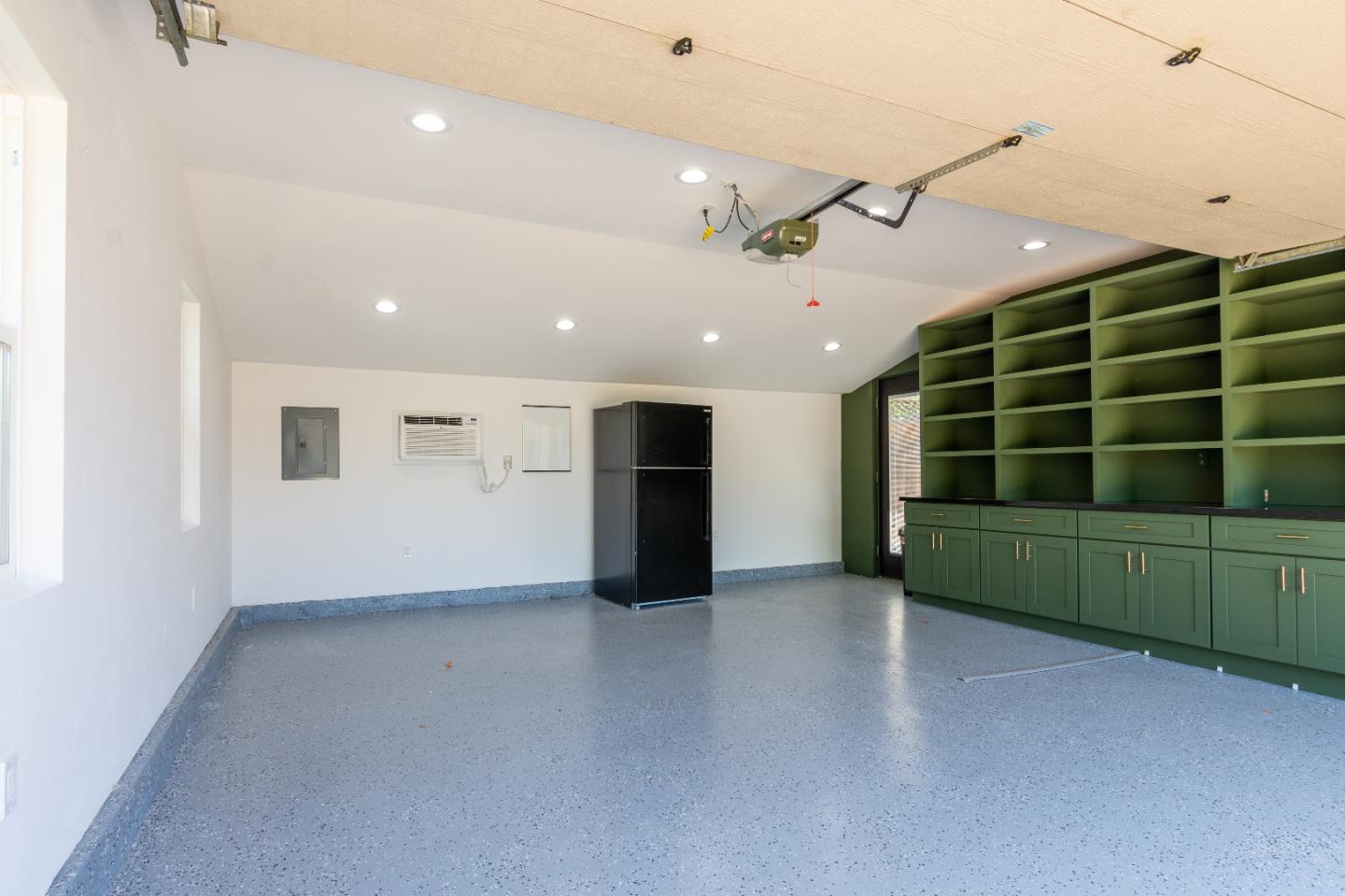 1674 Milroy Place San Jose, CA 95124 - Photo 10 of 12 a view of an empty room with a window and kitchen view