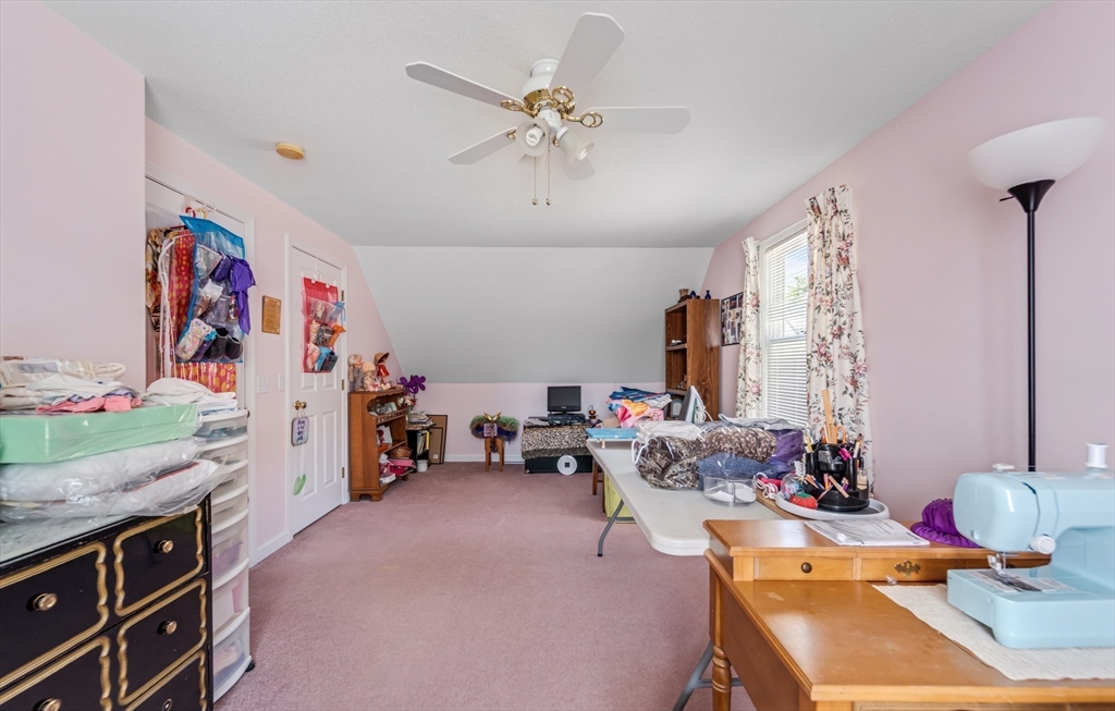 184 Russell Street Springfield, MA 01104 - Photo 19 of 28 a room with furniture and a flat screen tv