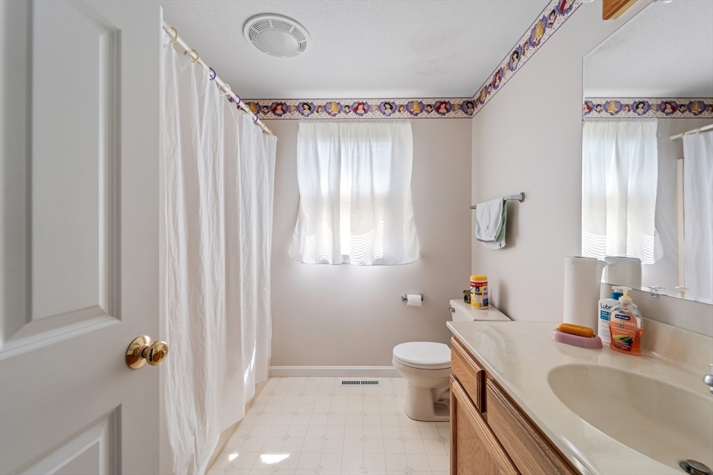 184 Russell Street Springfield, MA 01104 - Photo 23 of 28 a bathroom with a sink toilet and shower