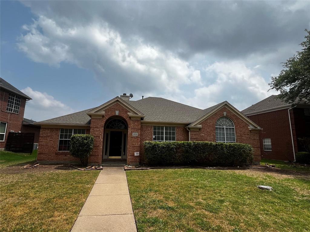 2904 Shasta Drive Plano, TX 75025 - Photo 1 of 4 a front view of a house with a yard