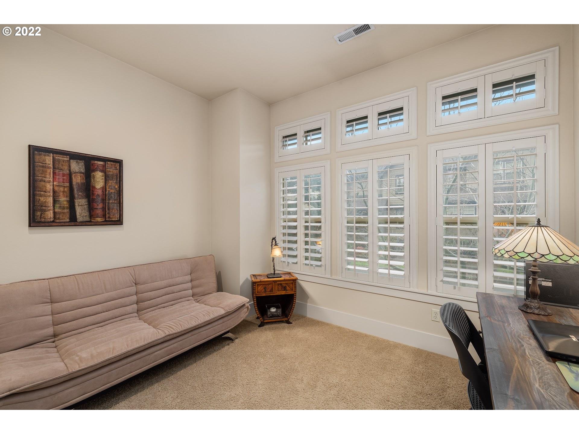 10460 Southwest Windwood Way Portland, OR 97225 - Photo 13 of 29 a living room with furniture and a window