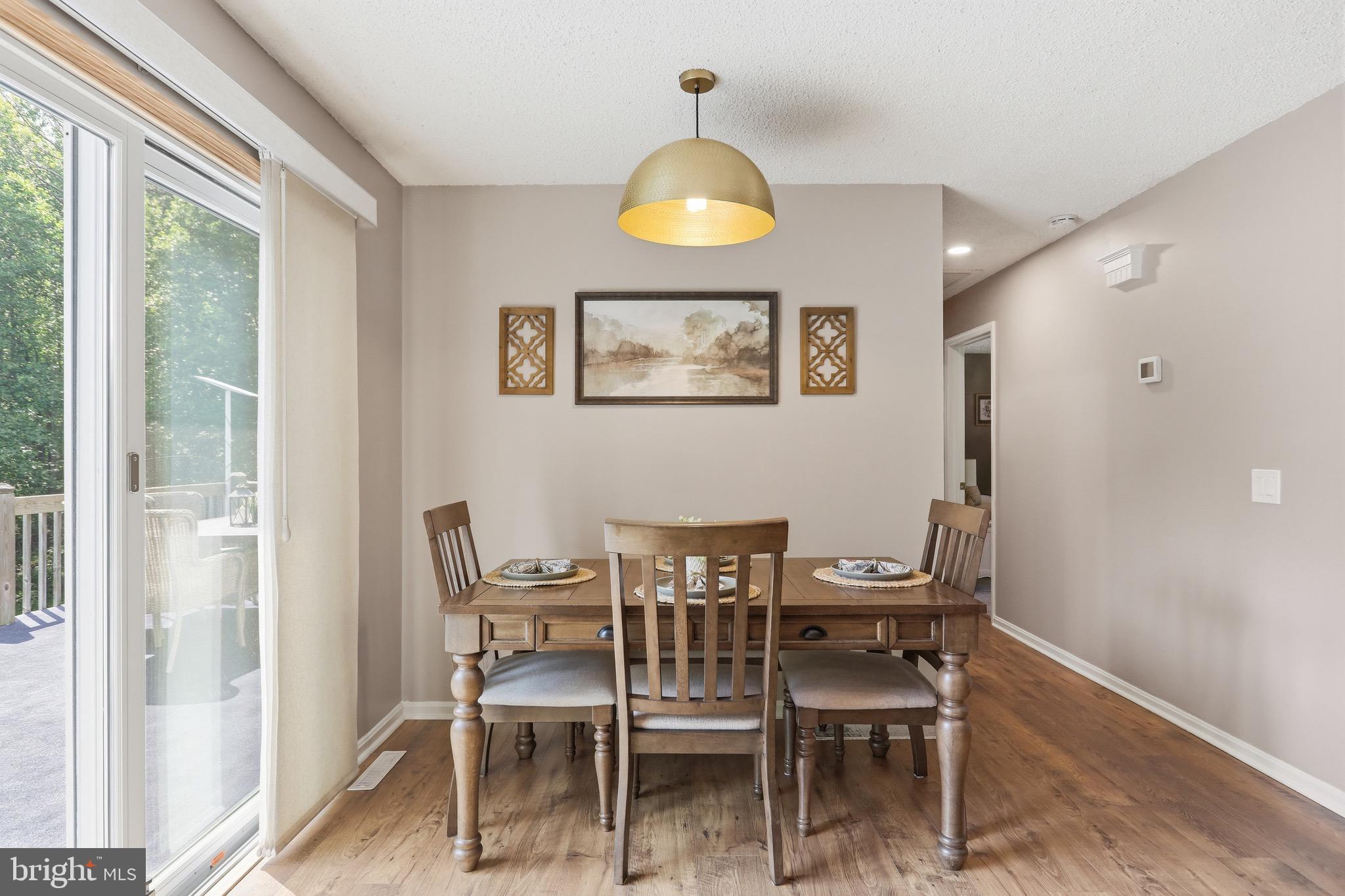 78 Lizzie Mills Road Castleton, VA 22716 - Photo 16 of 53 Dining area with sliding doors to rear deck
