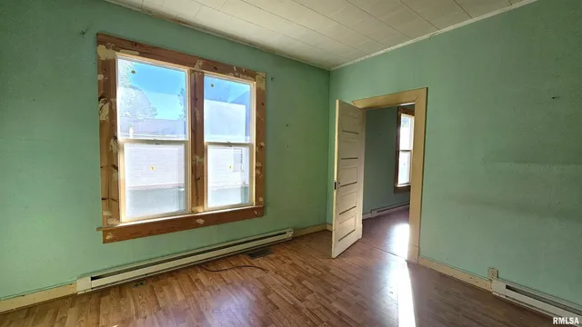 a view of a room that has a window in it