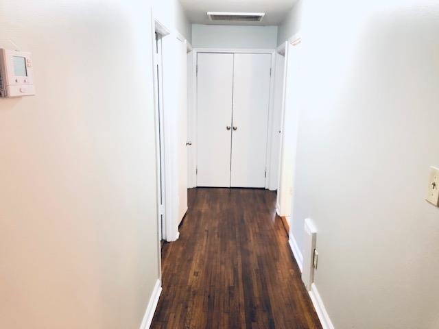 1381 Old Hickory Road Memphis, TN 38116 - Photo 17 of 24 a view of a hallway with wooden floor