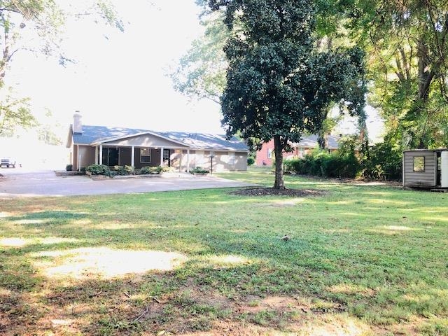 1381 Old Hickory Road Memphis, TN 38116 - Photo 6 of 24 a view of a house with a yard