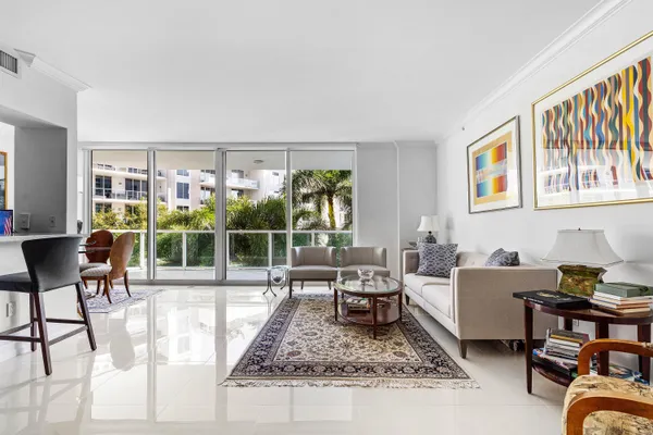 a living room with furniture and a rug