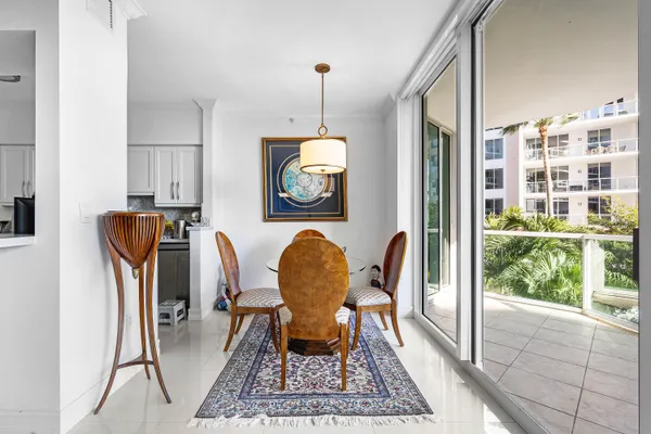 a kitchen with stainless steel appliances a stove microwave and cabinets
