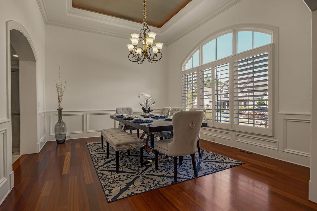110 Devan Kishan Way Mount Juliet, TN 37122 - Photo 11 of 76 a view of a dining room with furniture a chandelier and wooden floor