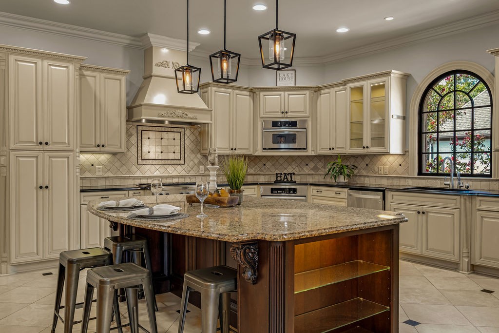 110 Devan Kishan Way Mount Juliet, TN 37122 - Photo 20 of 76 a kitchen with stainless steel appliances granite countertop a stove a sink and a refrigerator