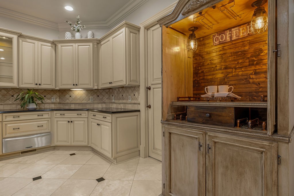 110 Devan Kishan Way Mount Juliet, TN 37122 - Photo 27 of 76 a kitchen with stainless steel appliances granite countertop a sink and cabinets