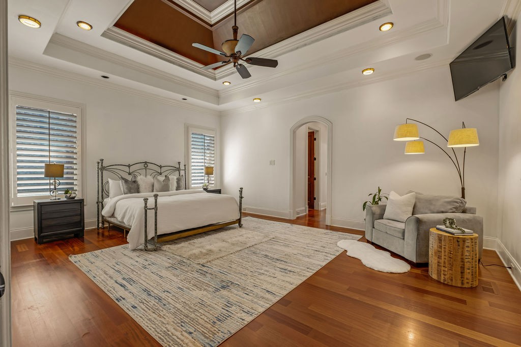 110 Devan Kishan Way Mount Juliet, TN 37122 - Photo 29 of 76 a bedroom with a large bed and a flat tv screen on a dresser