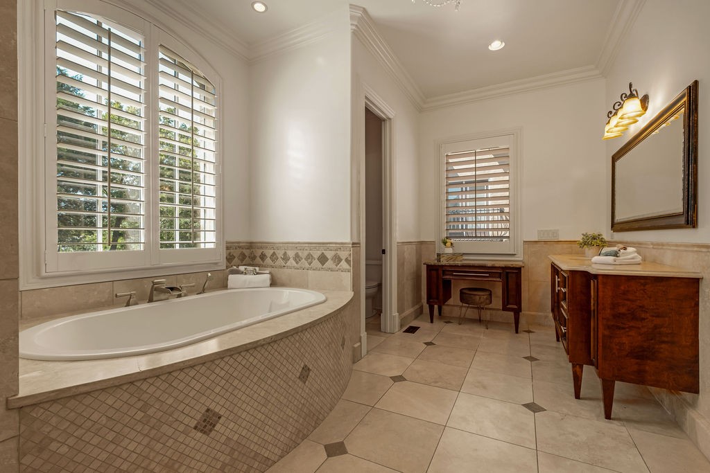 110 Devan Kishan Way Mount Juliet, TN 37122 - Photo 38 of 76 a spacious bathroom with a bathtub sink and a window