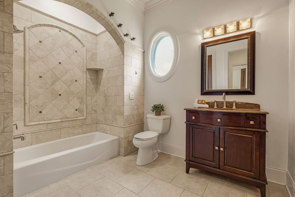 110 Devan Kishan Way Mount Juliet, TN 37122 - Photo 44 of 76 a bathroom with a toilet a sink a mirror a bathtub and a shower