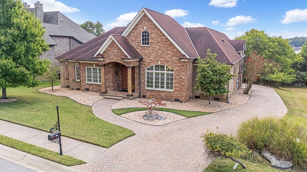 110 Devan Kishan Way Mount Juliet, TN 37122 - Photo 6 of 76 a front view of a house with garden