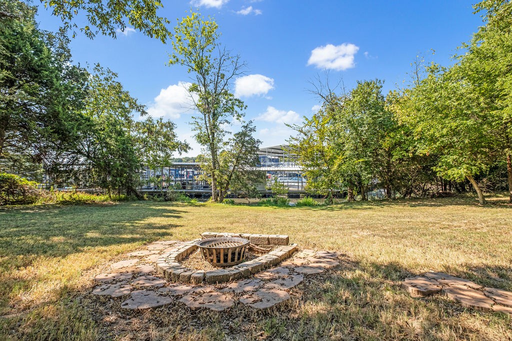 110 Devan Kishan Way Mount Juliet, TN 37122 - Photo 68 of 76 a view of a swimming pool with an outdoor space and seating area
