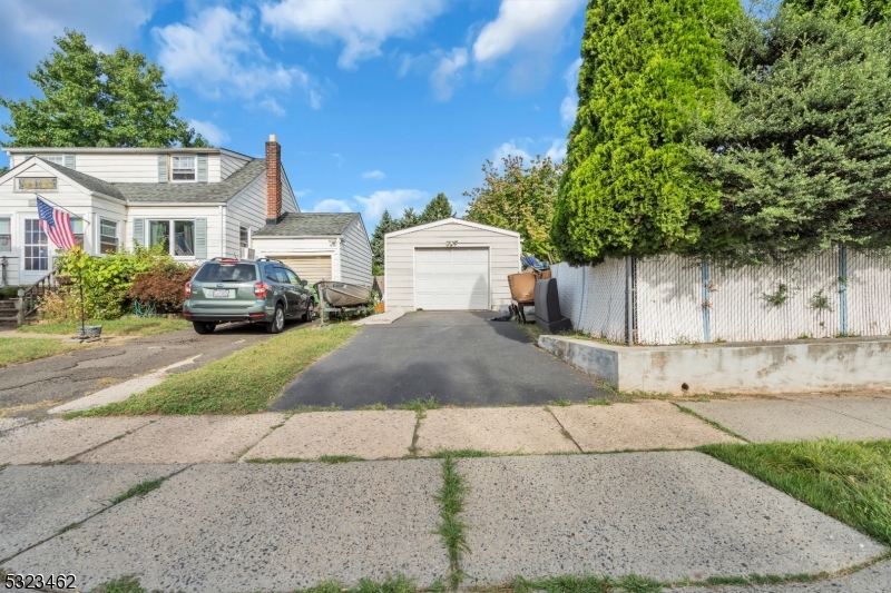 2801 Dewitt Terrace Linden, NJ 07036 - Photo 20 of 23 a front view of a house with a garden