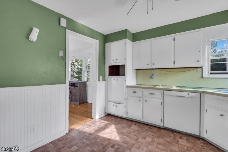 2801 Dewitt Terrace Linden, NJ 07036 - Photo 4 of 23 a view of a kitchen with cabinets and wooden floor
