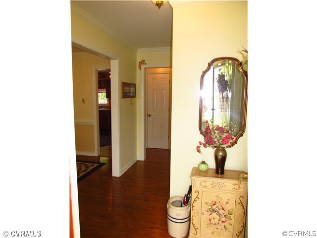 6627 Turngate Road North Chesterfield, VA 23234 - Photo 3 of 24 Foyer - THE FOYER FEATURES WOOD FLOORS, CROWN MOLD