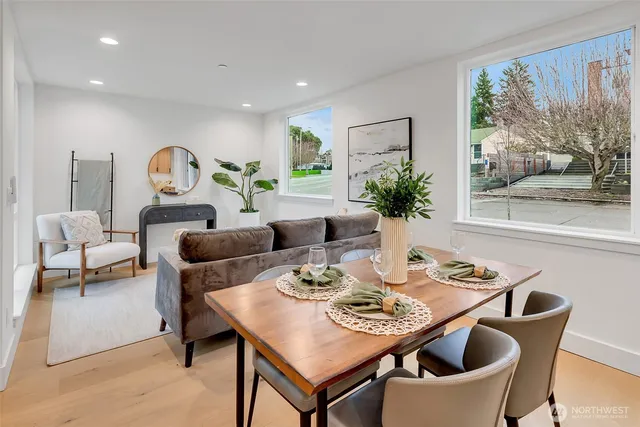 a view of a dining room with furniture window and outside view