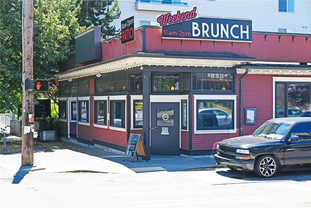 a view of a chairs and table in the patio