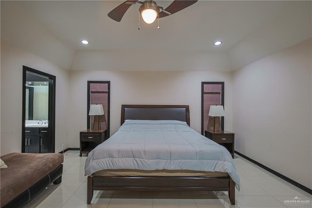 412 Toronto Avenue, Unit 34 McAllen, TX 78503 - Photo 20 of 44 Bedroom featuring ceiling fan, light tile patterned floors, and recessed lighting