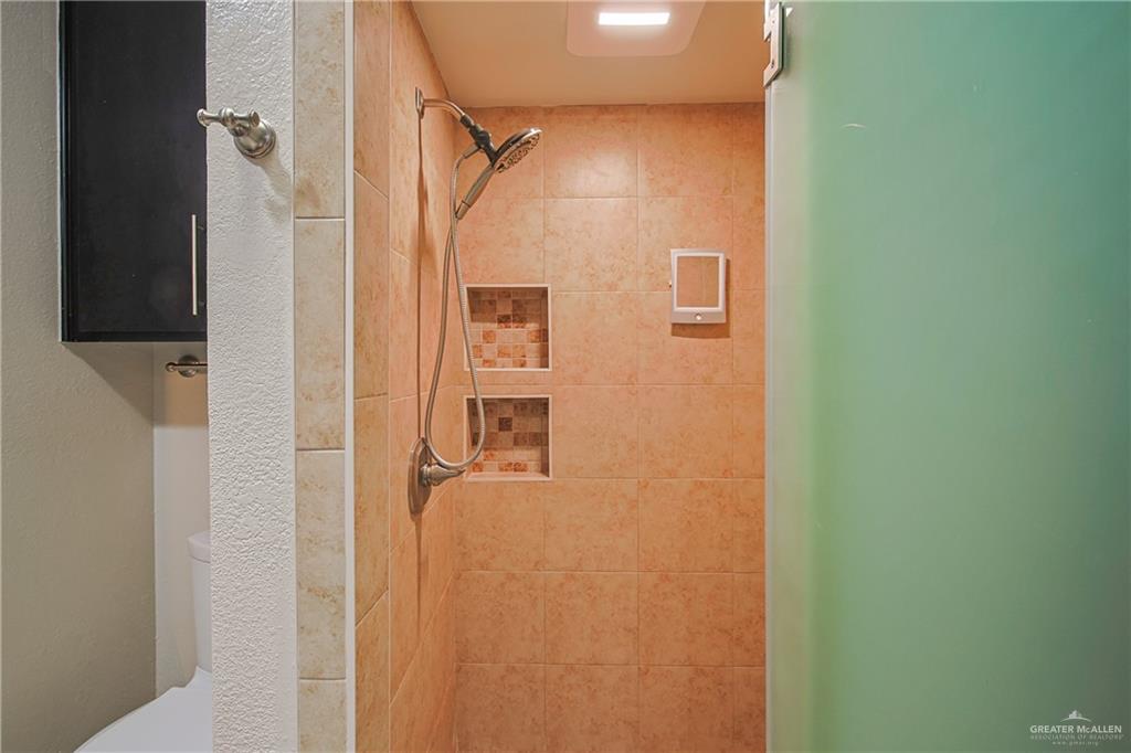 412 Toronto Avenue, Unit 34 McAllen, TX 78503 - Photo 29 of 44 Bathroom with a shower stall