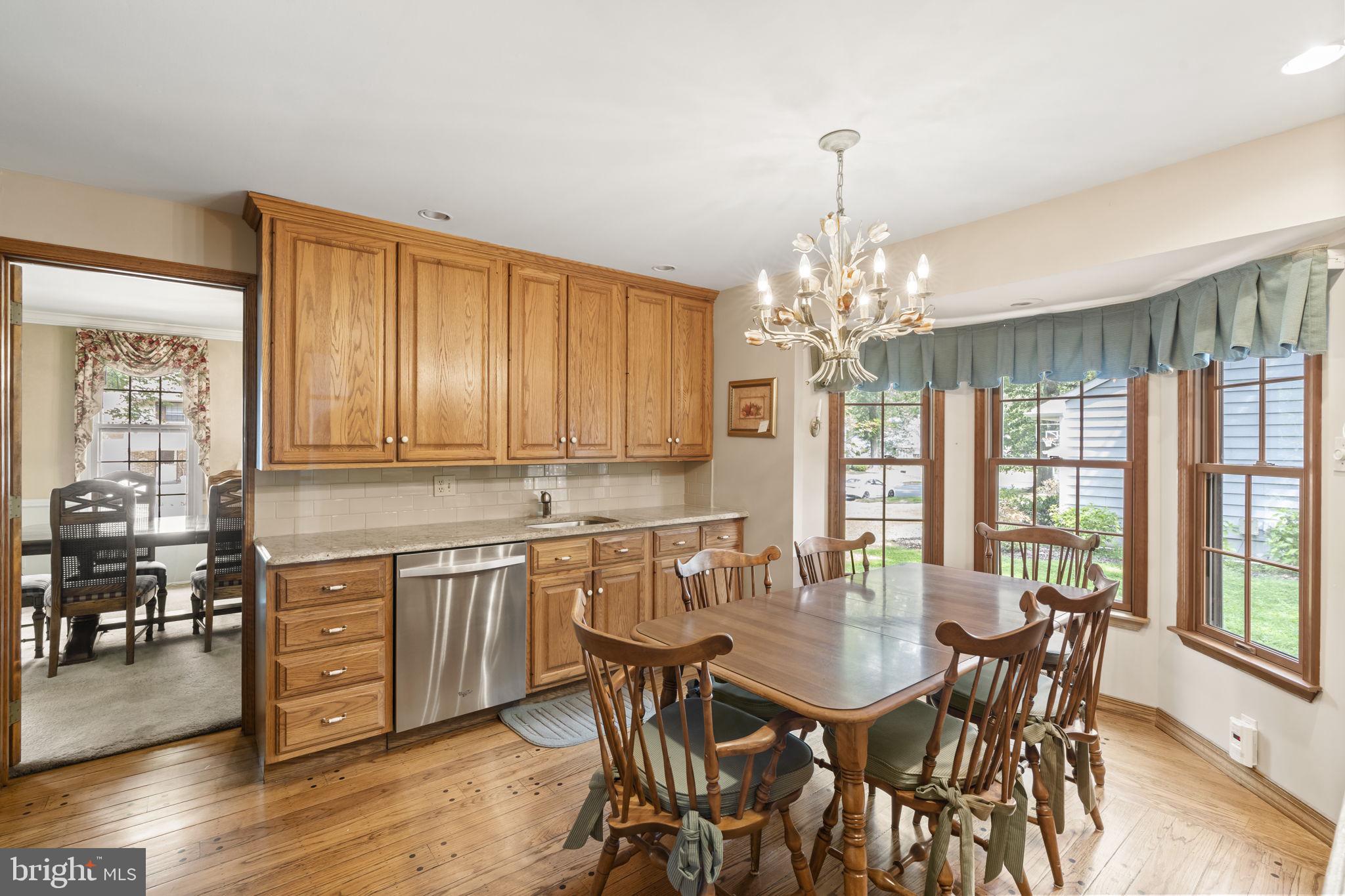 16 Whitby Road Cherry Hill, NJ 08003 - Photo 11 of 28 a view of a a dining room with furniture window and wooden floor