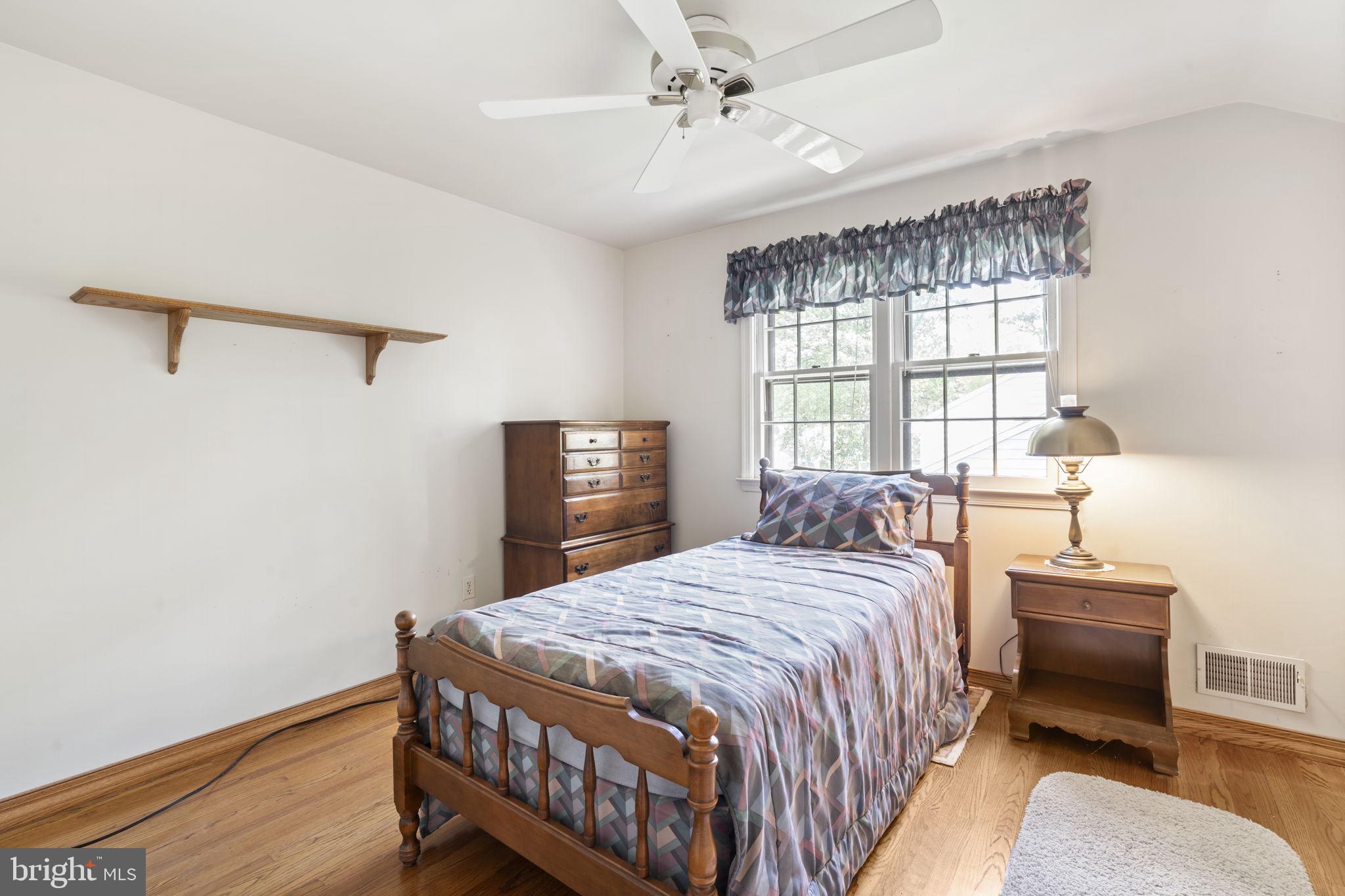 16 Whitby Road Cherry Hill, NJ 08003 - Photo 23 of 28 a bedroom with a bed and a window