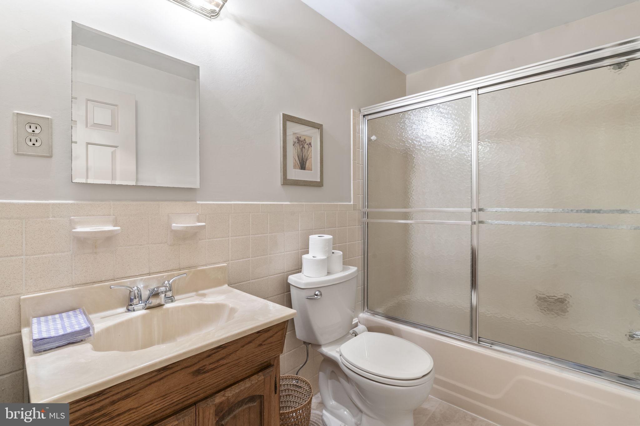 16 Whitby Road Cherry Hill, NJ 08003 - Photo 24 of 28 a bathroom with a sink toilet a mirror and shower