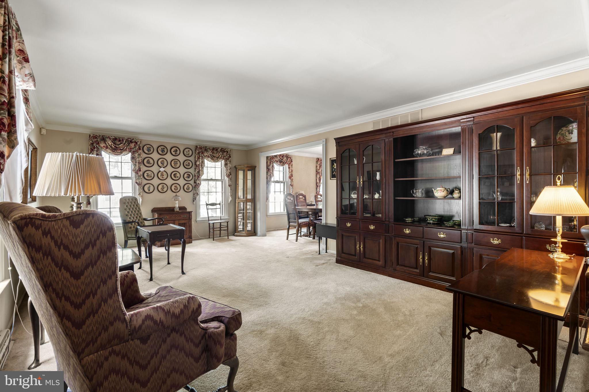 16 Whitby Road Cherry Hill, NJ 08003 - Photo 7 of 28 a living room with furniture and a flat screen tv