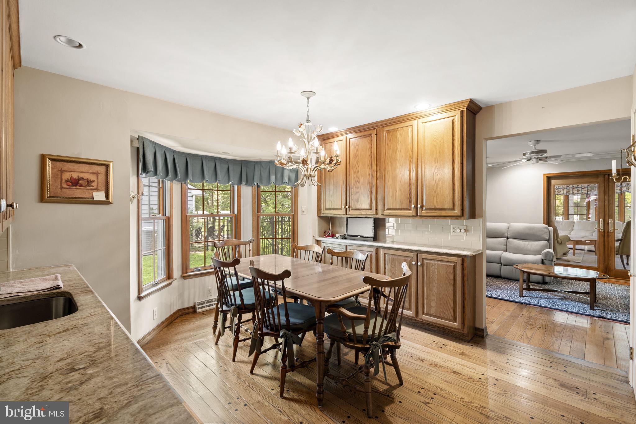 16 Whitby Road Cherry Hill, NJ 08003 - Photo 10 of 28 a view of a a dining room with furniture window and wooden floor