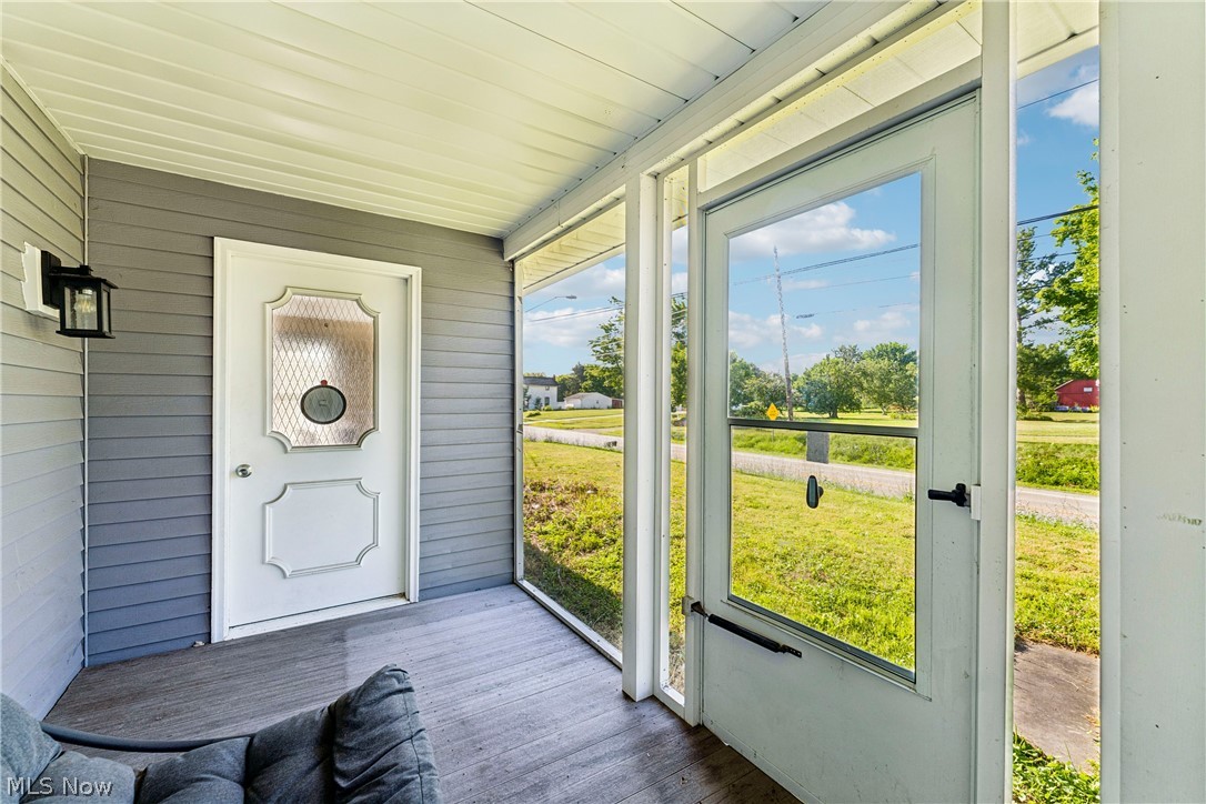 6711 Norwalk Road Medina, OH 44256 - Photo 6 of 46 Sun room or screened-in porch with entry door