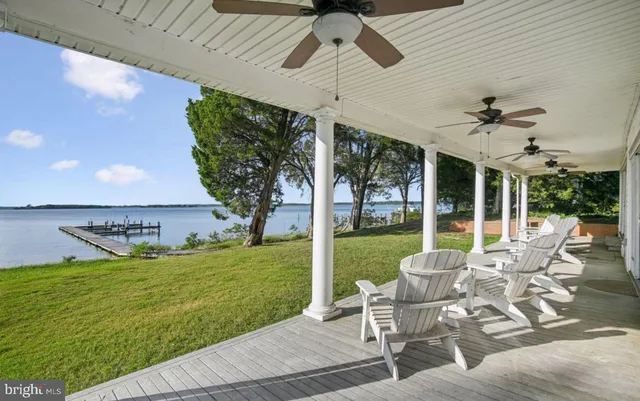 a view of a patio with a yard