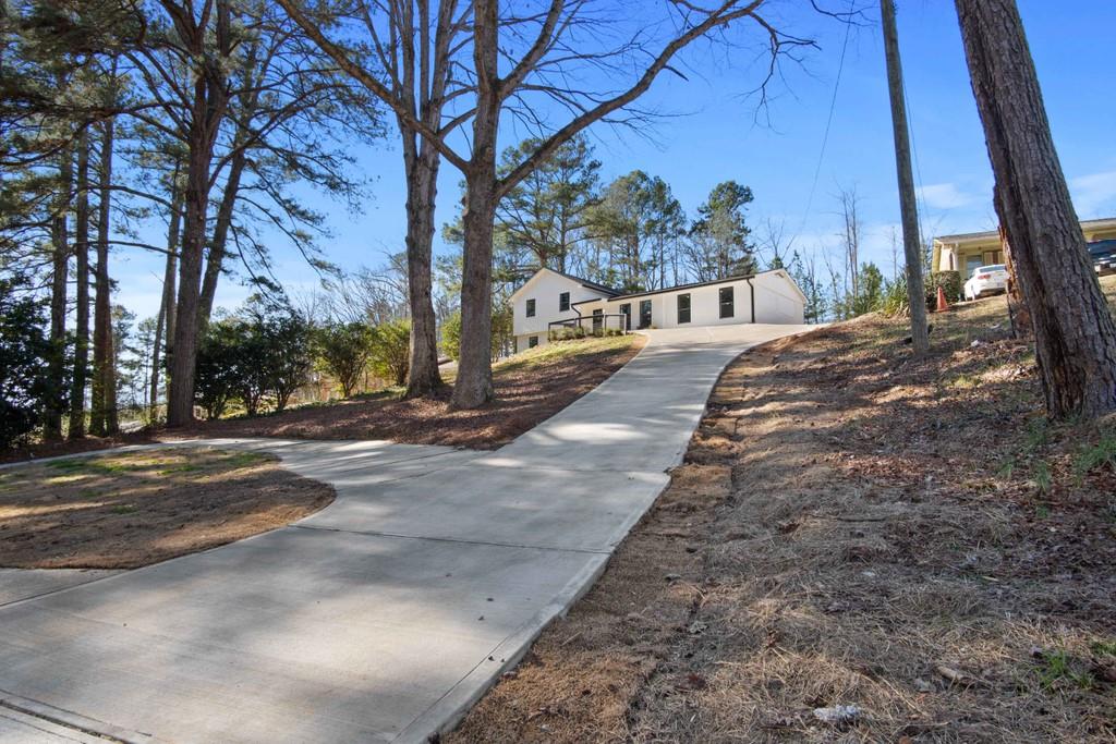 2475 Enon Road Atlanta, GA 30331 - Photo 1 of 1 a view of a street with a tree in the background