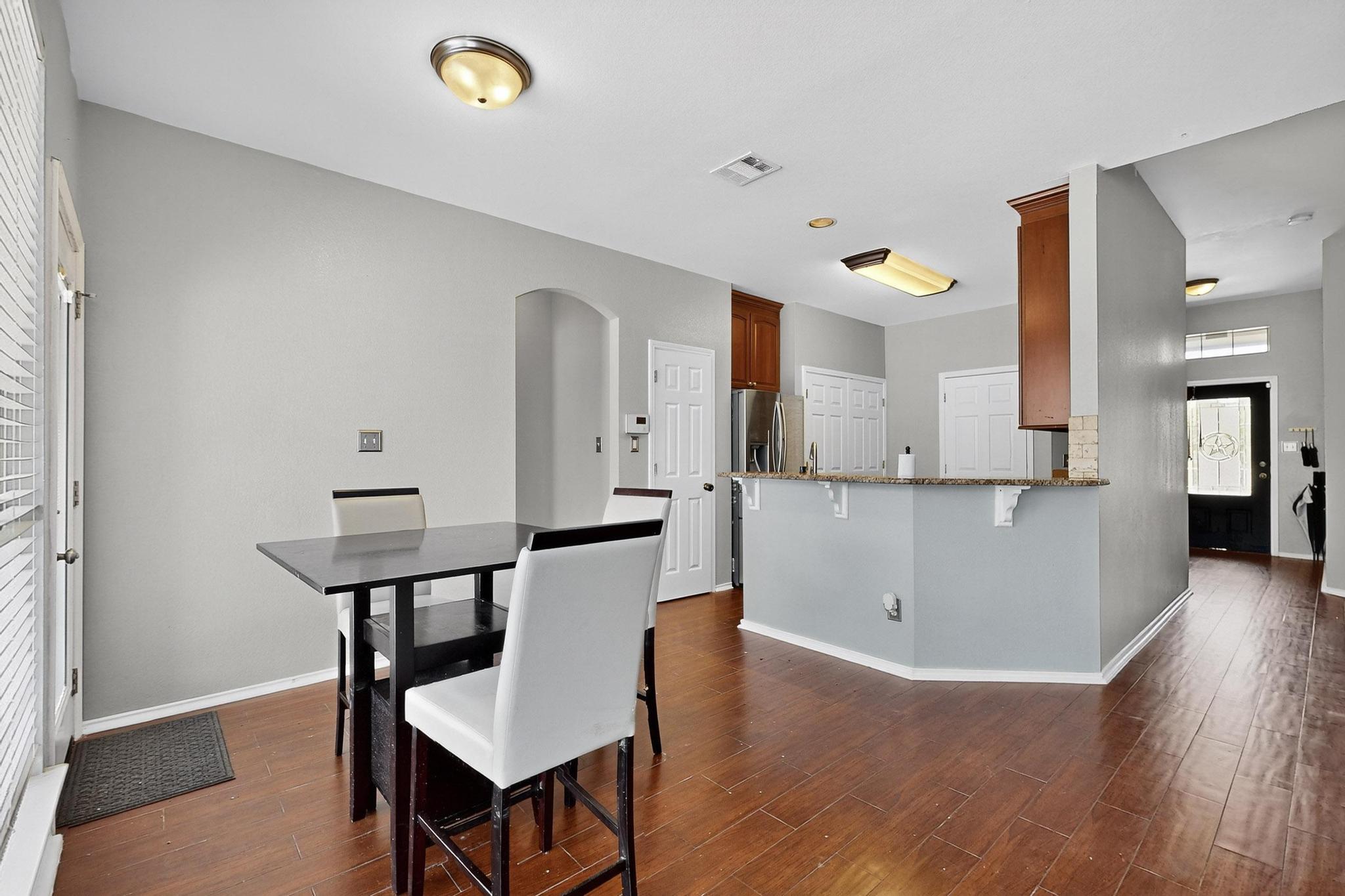 2403 Willow Way Round Rock, TX 78664 - Photo 12 of 35 a view of kitchen with furniture and wooden floor