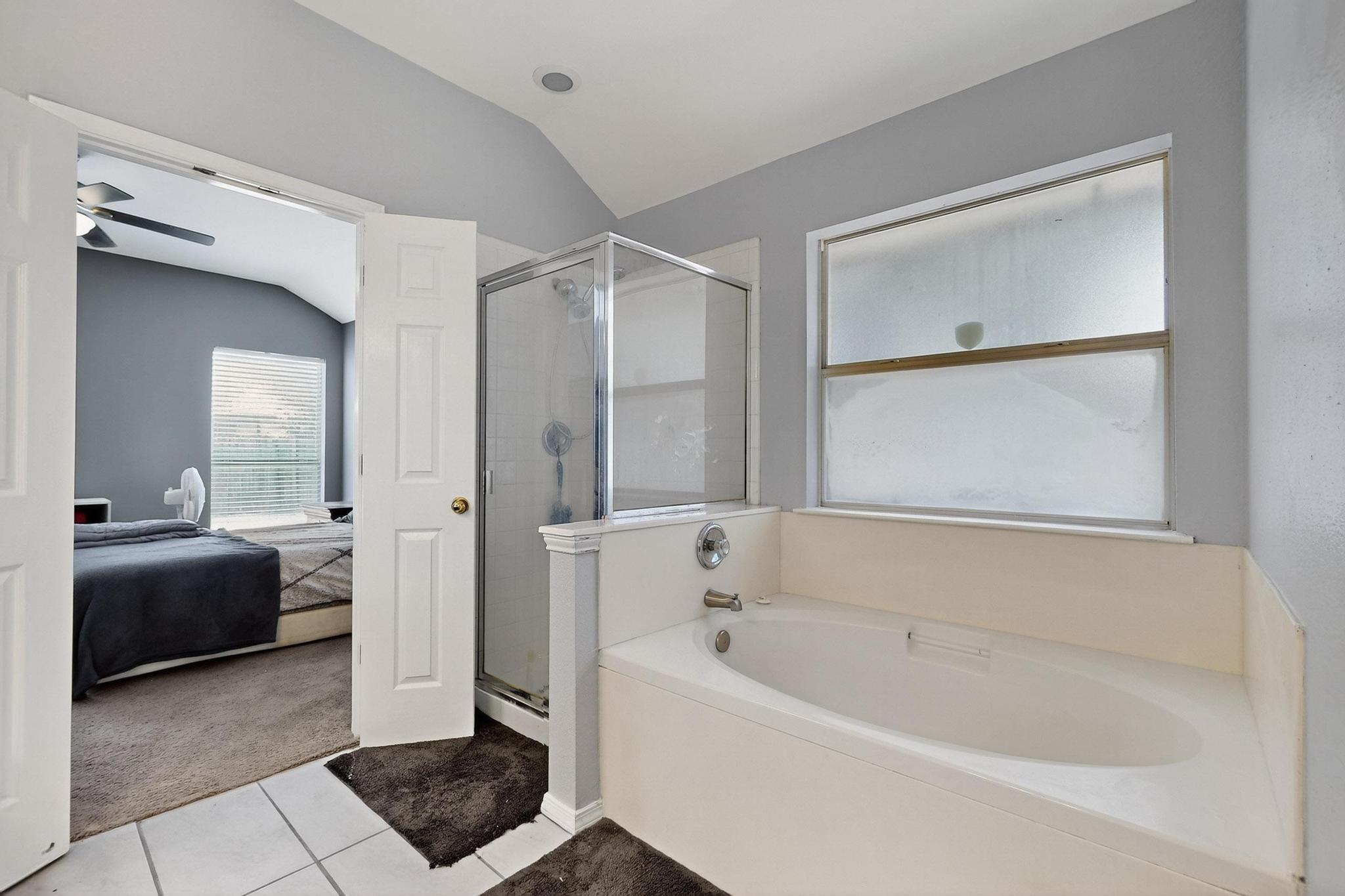 2403 Willow Way Round Rock, TX 78664 - Photo 25 of 35 a bathroom with a tub shower and a sink