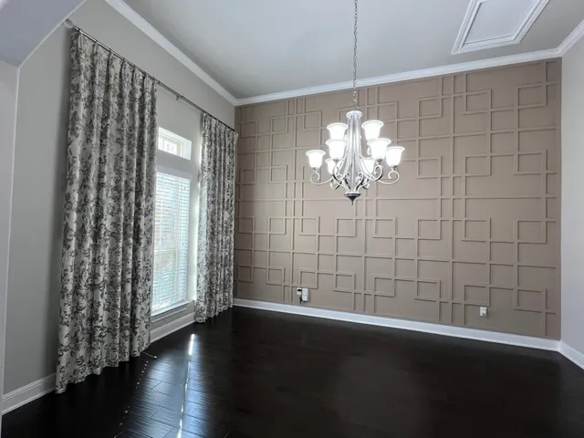 a view of a kitchen from the hallway