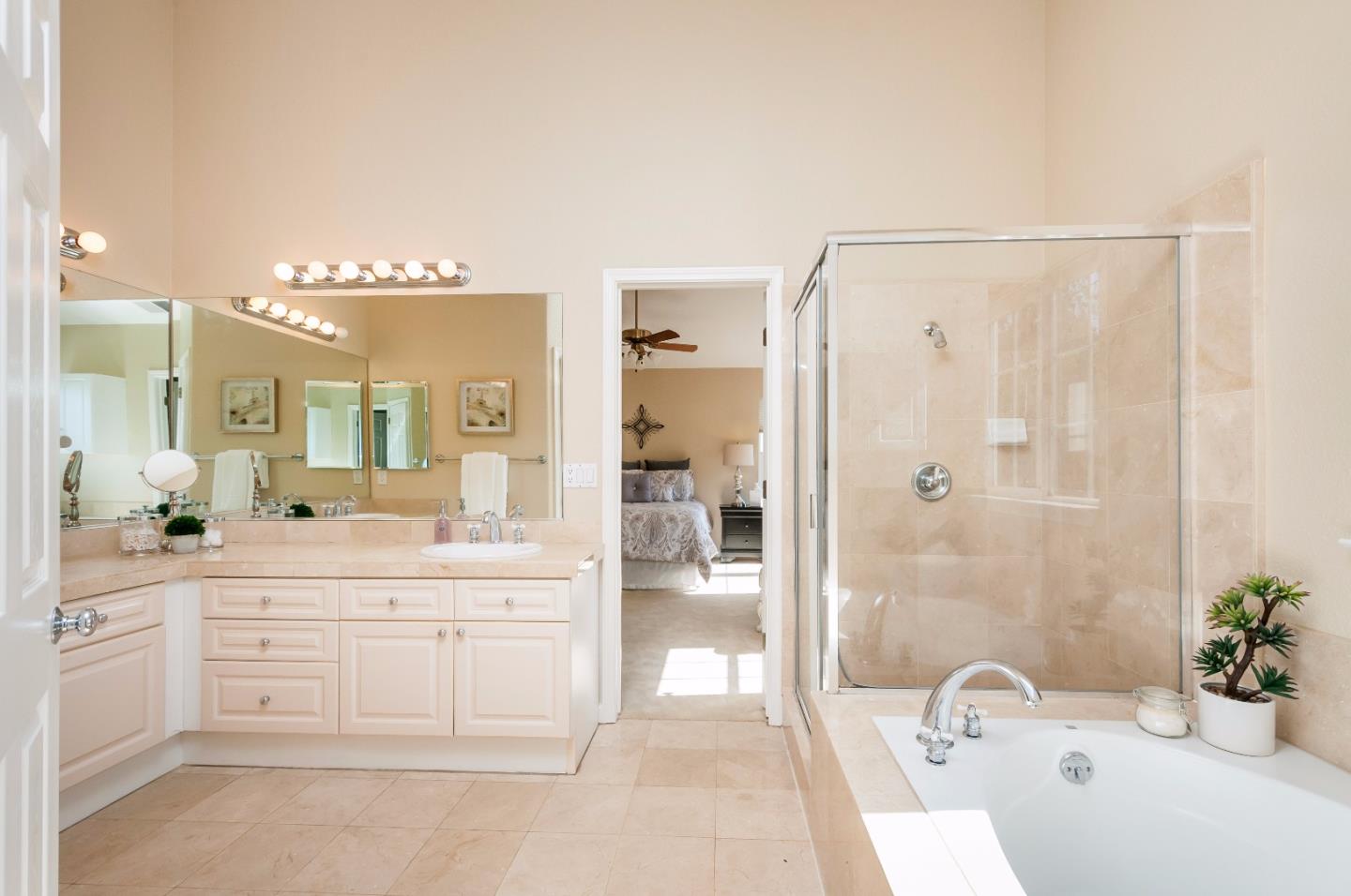 1 Ralston Ranch Road Belmont, CA 94002 - Photo 15 of 27 a spacious bathroom with a granite countertop sink a mirror a vanity and shower