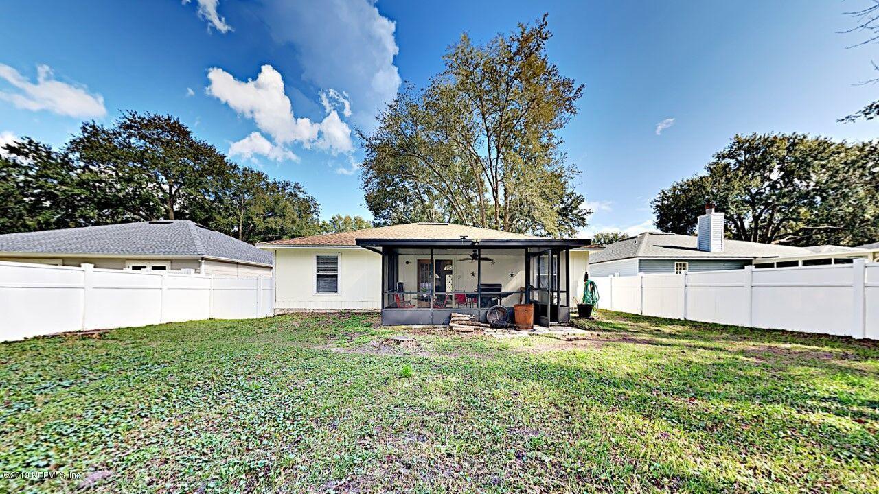 12830 Moose Road Jacksonville, FL 32226 - Photo 30 of 31 a view of a house with a yard