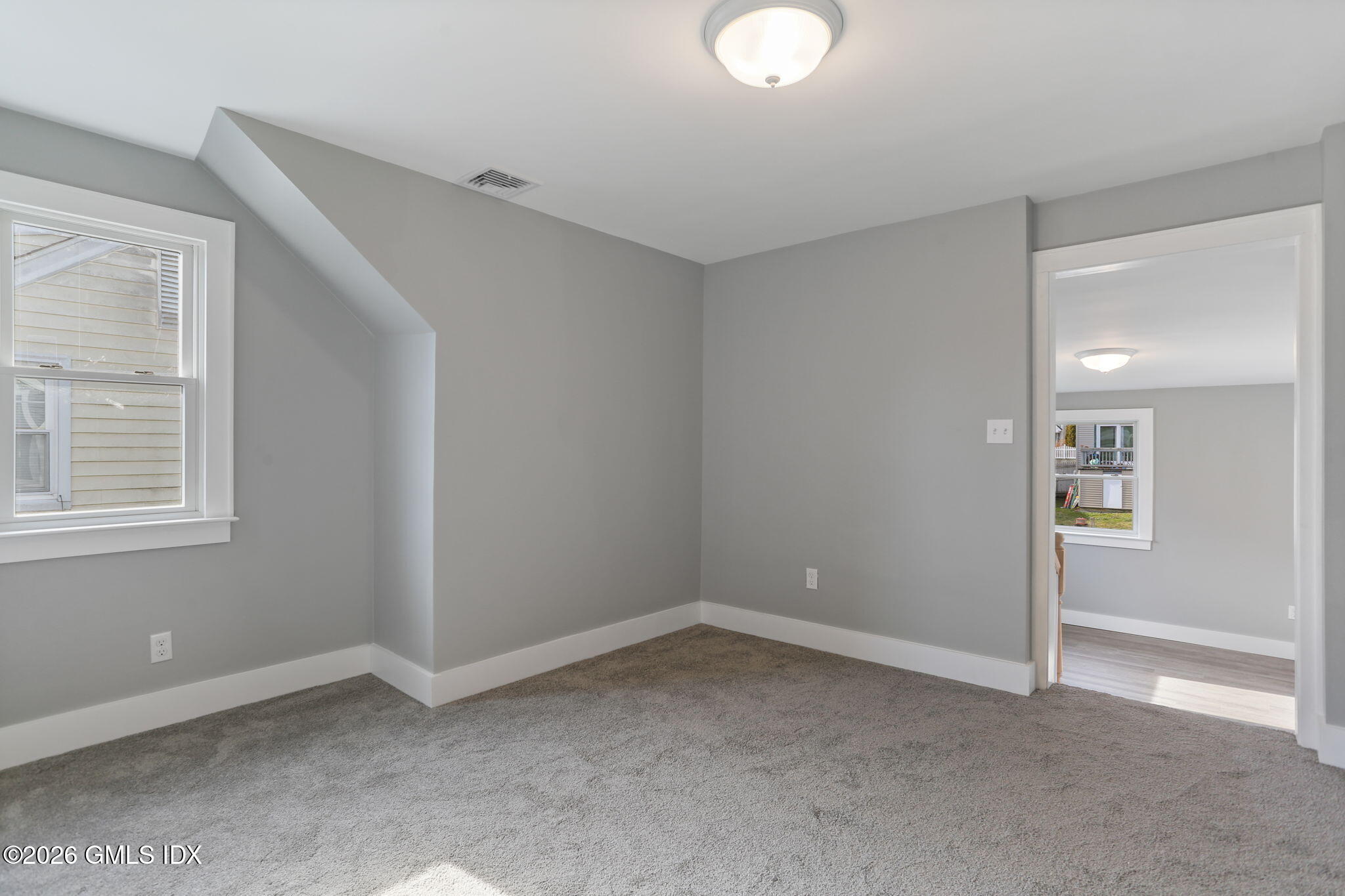 35 Euclid Avenue, Unit B Stamford, CT 06902 - Photo 16 of 27 a view of an empty room with a window